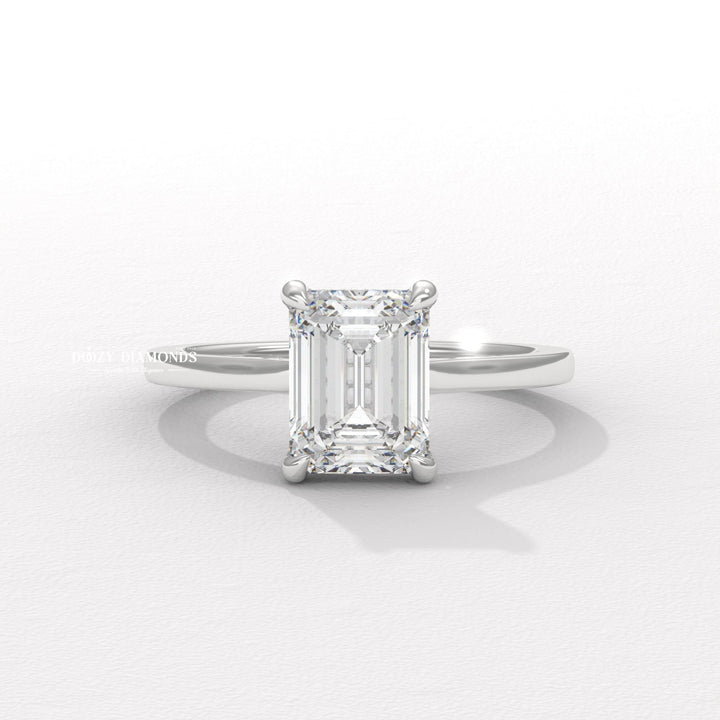 Classic emerald hidden halo engagement ring crafted for everyday wear