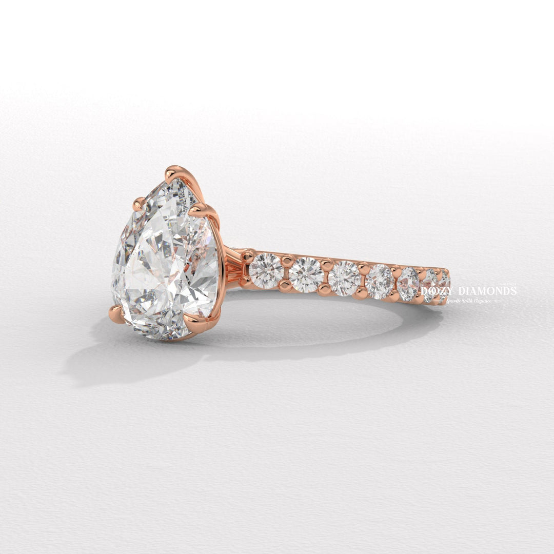 Pear solitaire lab grown diamond ring side profile in gold setting