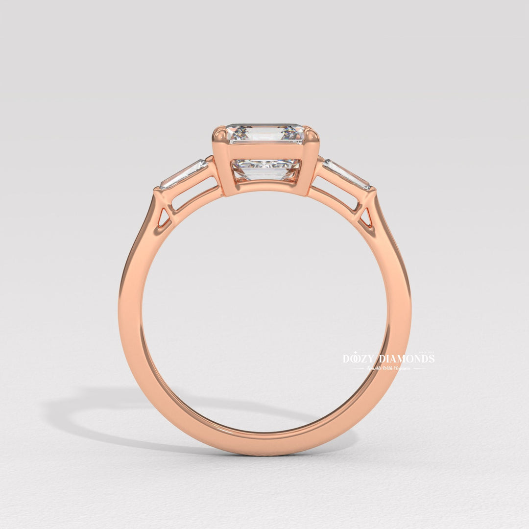 Asscher three stone lab grown diamond ring fitted on finger