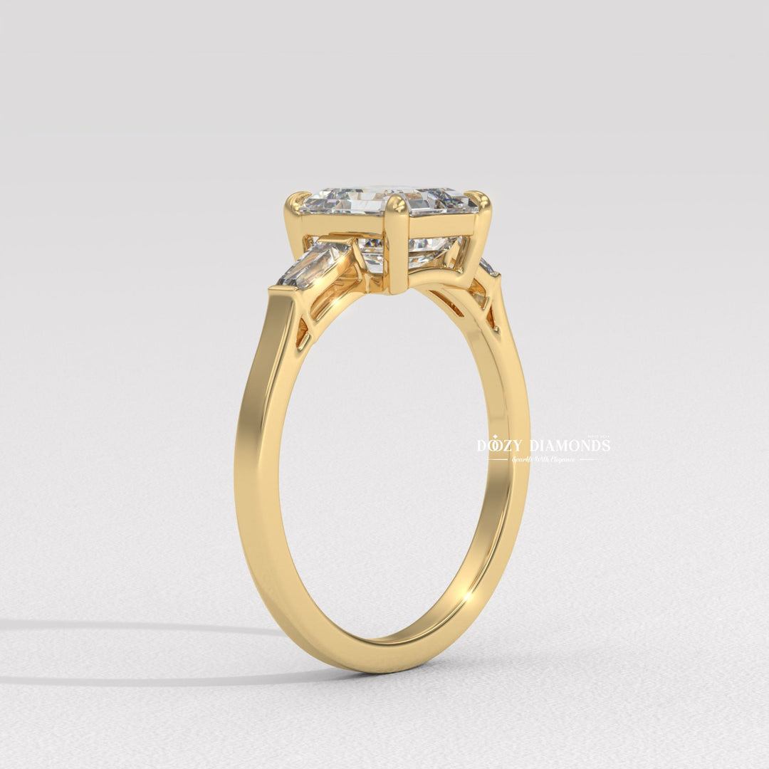 Macro shot of asscher cut diamond facets in three stone ring setting