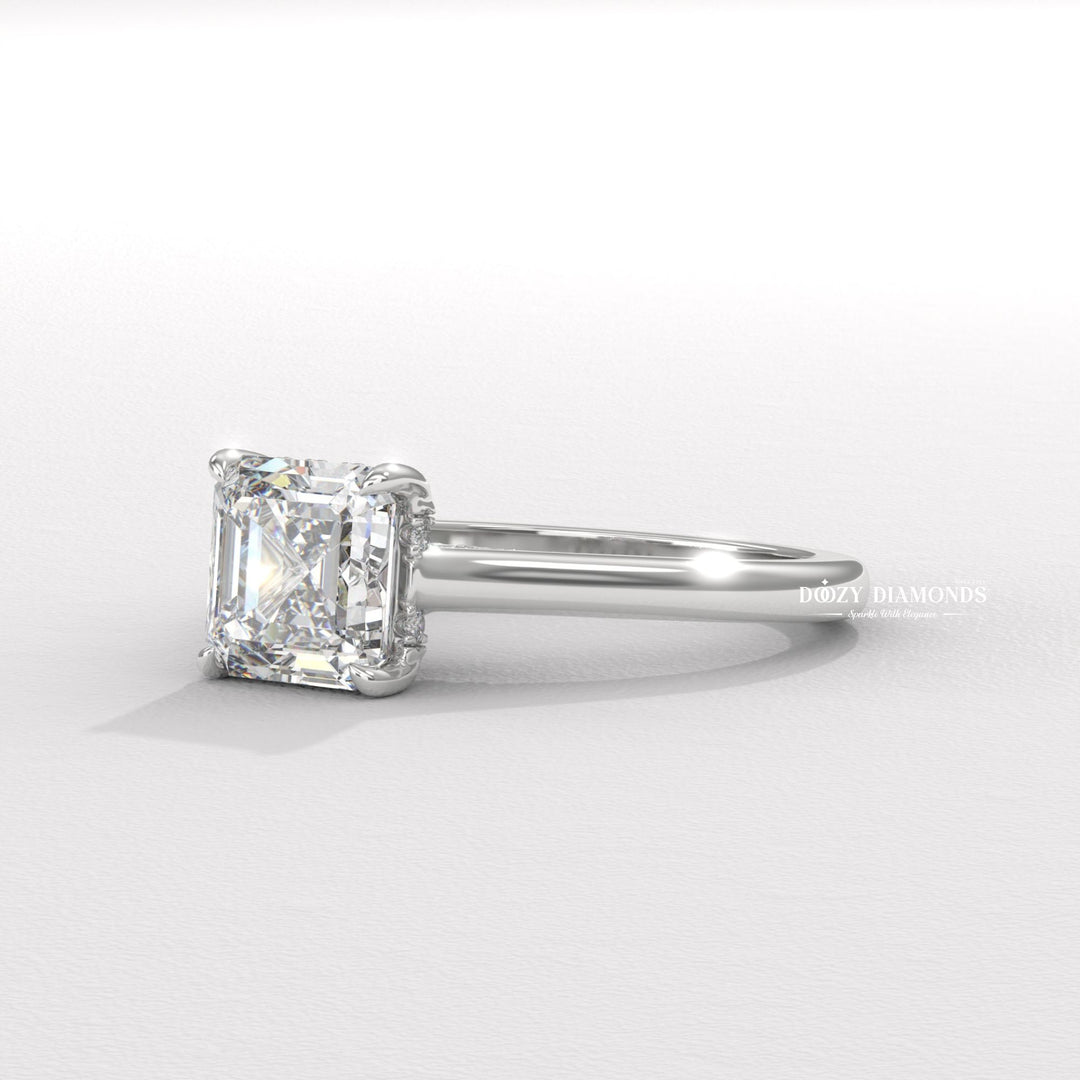 Angled view of asscher cut diamond in hidden halo setting