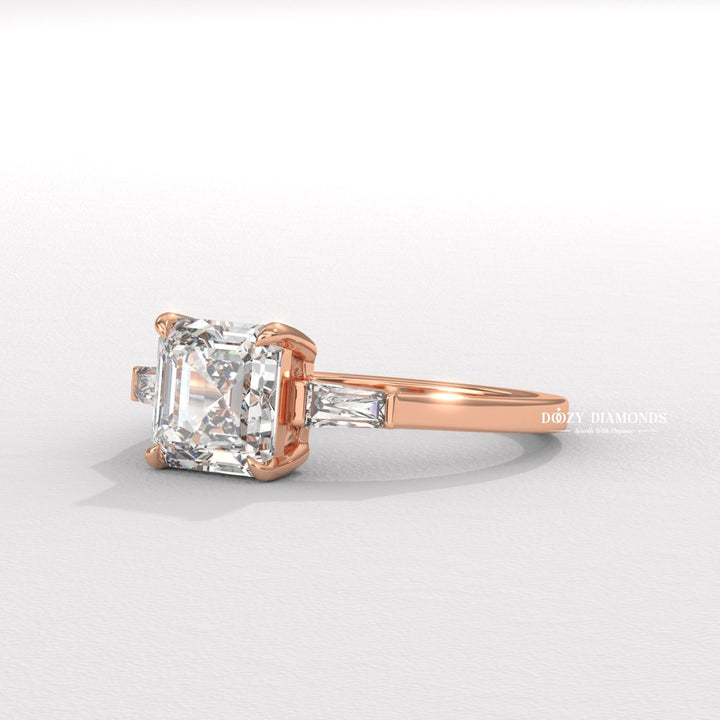 Asscher cut three stone engagement ring shown in real-life wear
