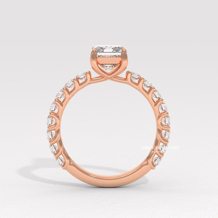 Lifestyle shot of emerald pave diamond ring on hand
