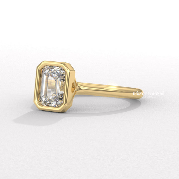 Emerald bezel lab grown diamond ring side profile in gold setting