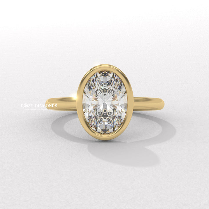Discover oval bezel lab grown diamond engagement ring online
