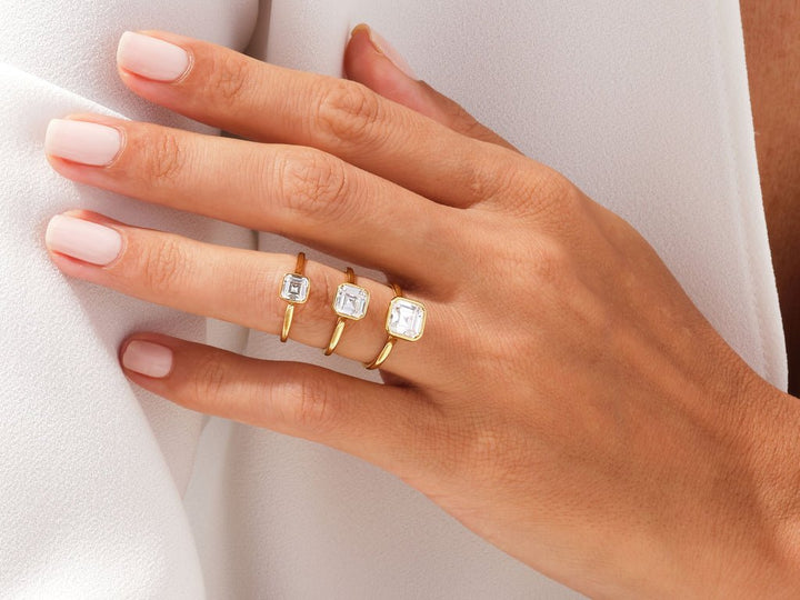 Shop the asscher cut bezel engagement ring collection online