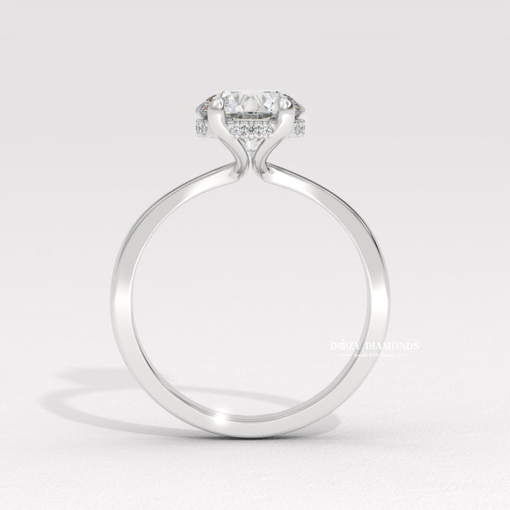 Detailed close-up of diamond solitaire diamond engagement ring