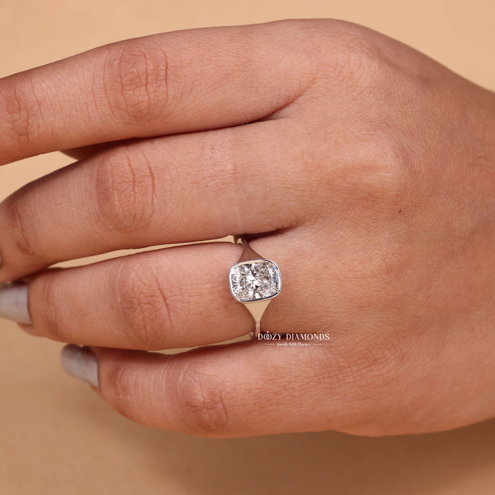 Cushion bezel engagement ring viewed from the side