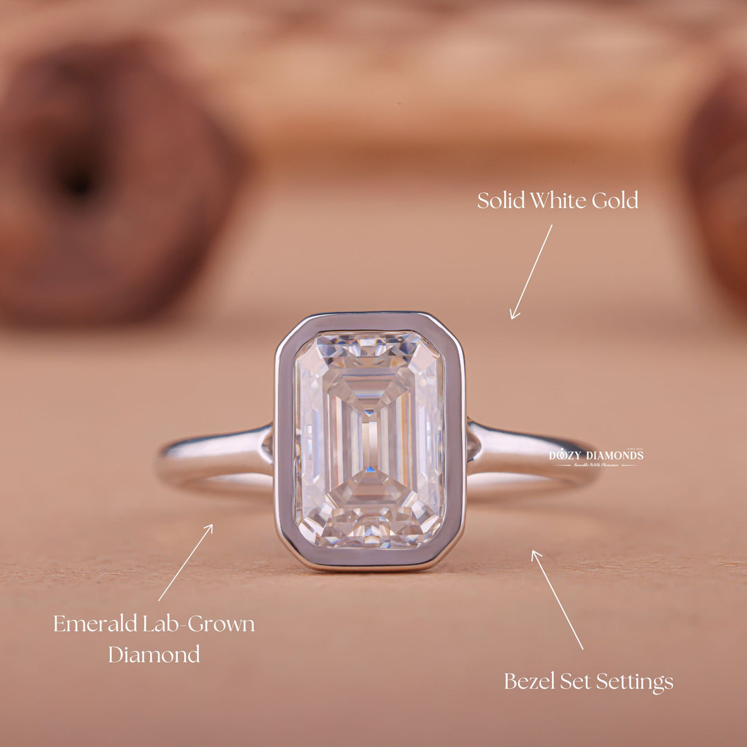 Emerald cut diamond ring worn on hand