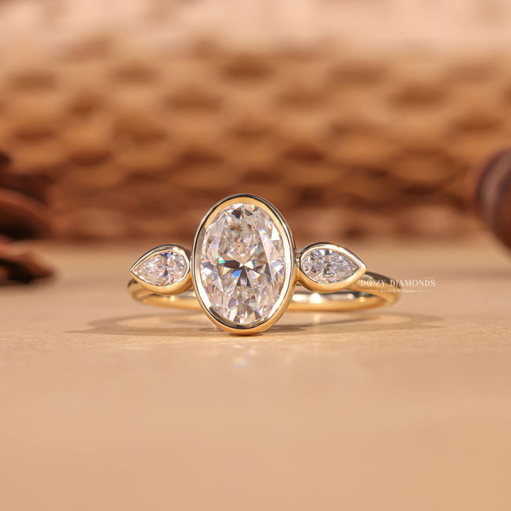 Certified oval cut diamond featured in bezel engagement ring
