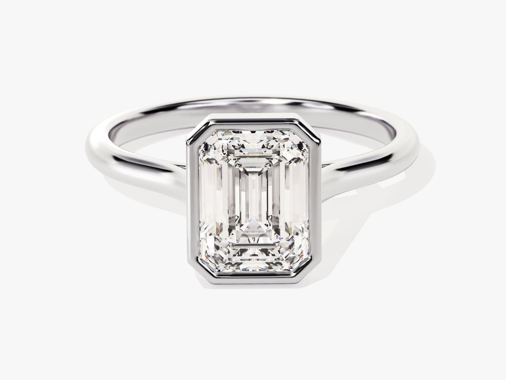 Emerald bezel engagement ring close-up showing high clarity diamond clarity