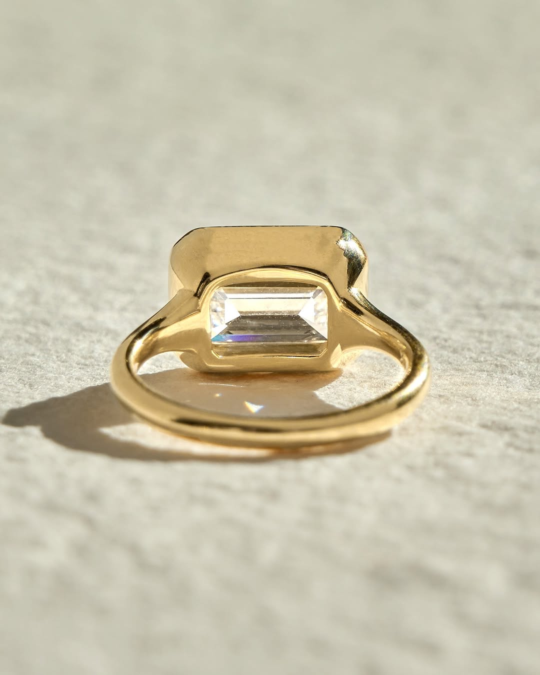 Buy emerald cut bezel diamond engagement ring with free shipping