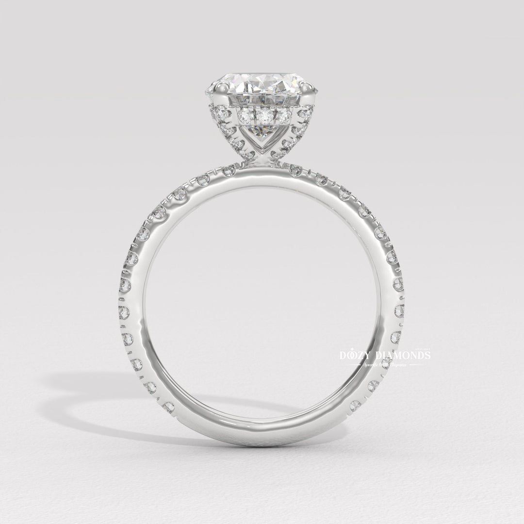 Profile view of oval cut hidden halo engagement ring band