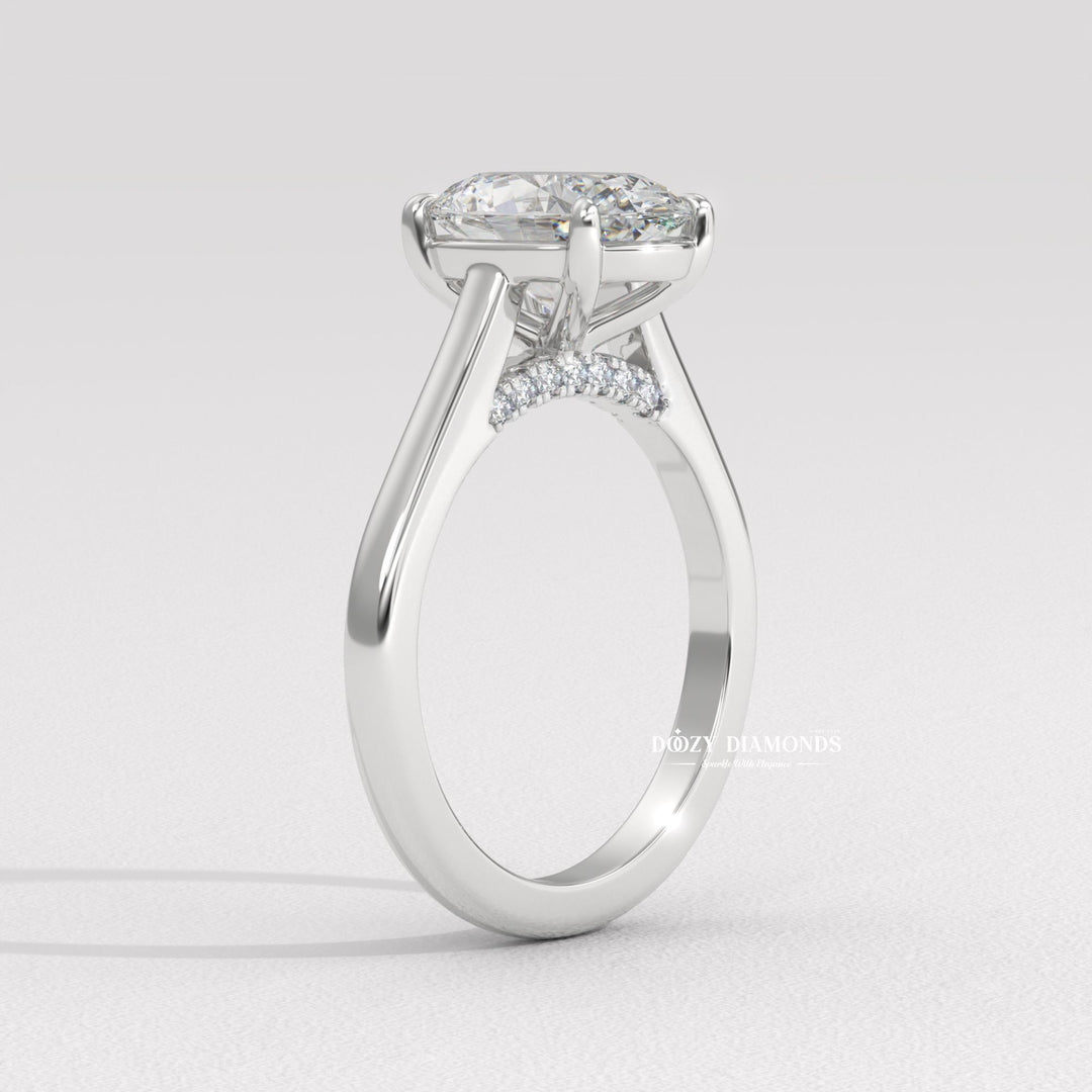 Macro shot of oval cut diamond facets in solitaire ring setting