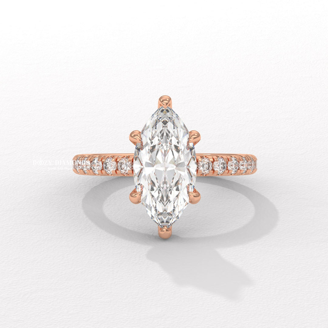 Marquise solitaire engagement ring close-up highlighting diamond sparkle