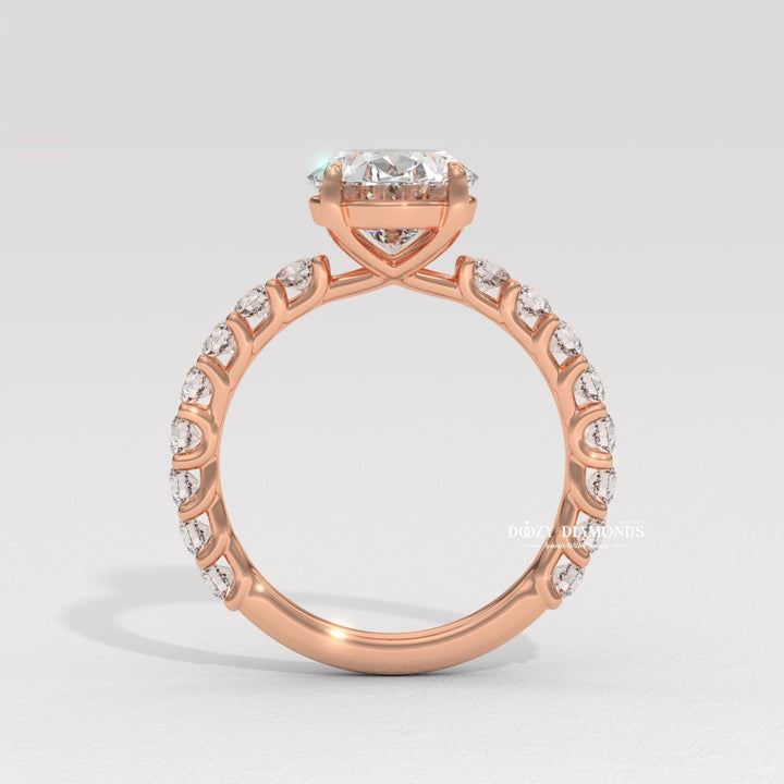 Profile view of oval cut pave engagement ring band