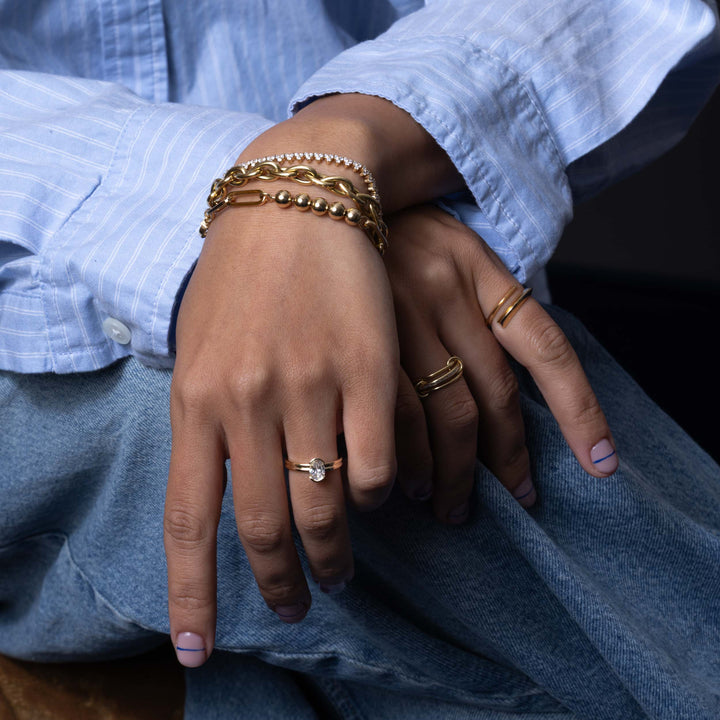Shop the oval cut bezel engagement ring collection online