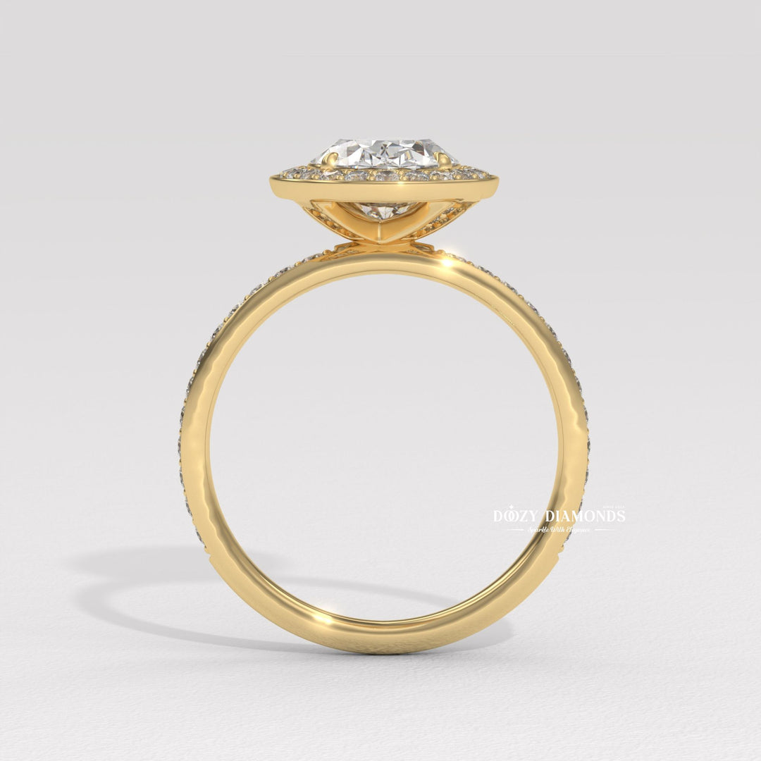 Lifestyle shot of oval halo diamond ring on hand
