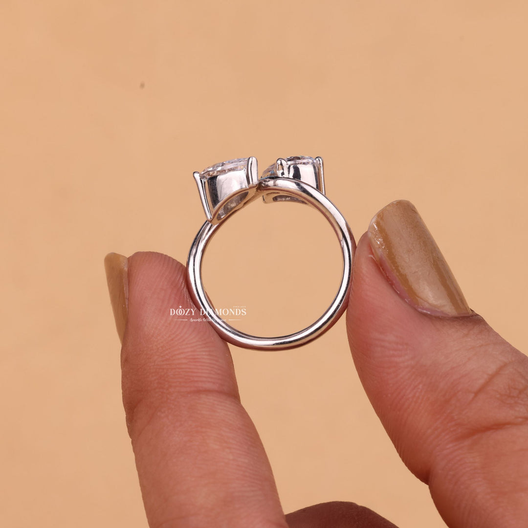 Pear cut diamond ring worn on hand