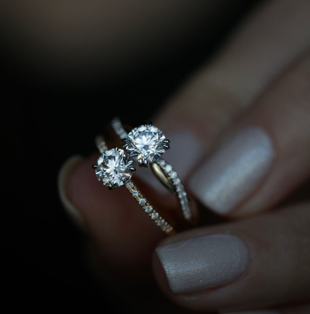 Round cut engagement ring side view showing band detail