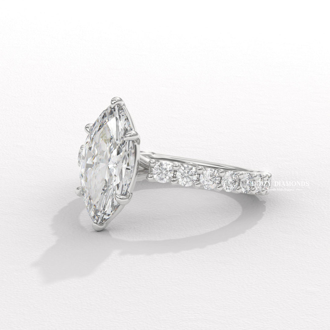 Marquise solitaire lab grown diamond ring fitted on finger