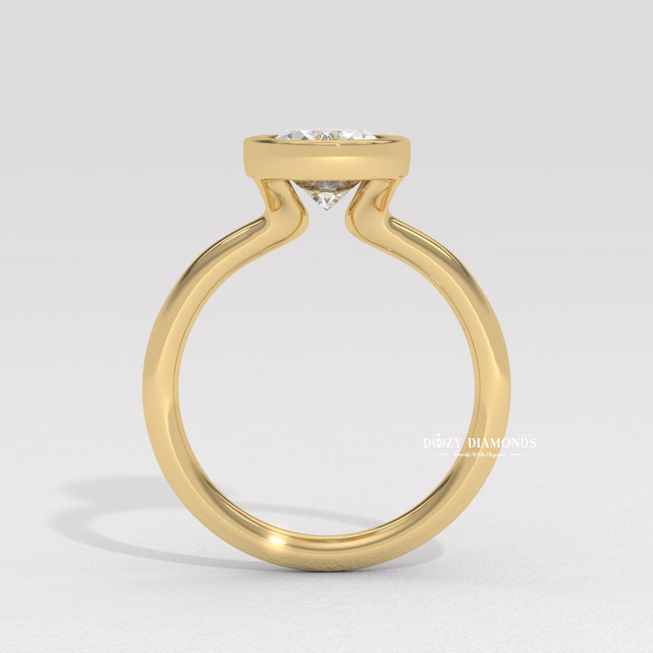 Unboxing view of oval cut bezel diamond engagement ring