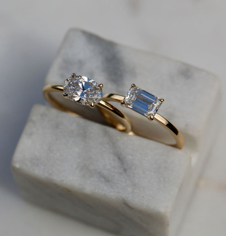 Oval solitaire lab grown diamond ring side profile in gold setting