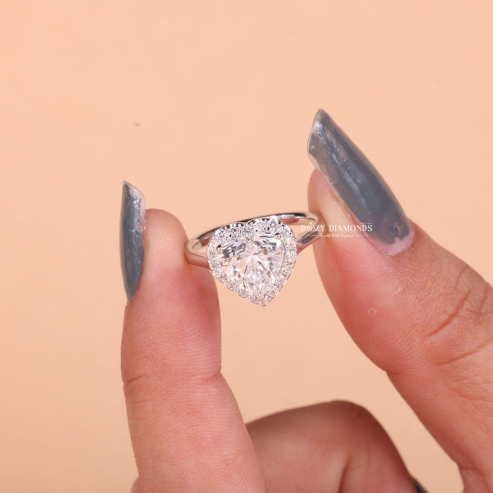 Heart cut halo engagement ring with IGI certified center diamond