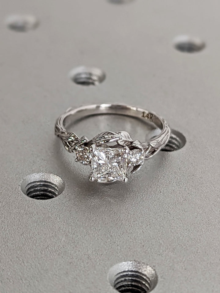 Unboxing view of princess cut vintage diamond engagement ring
