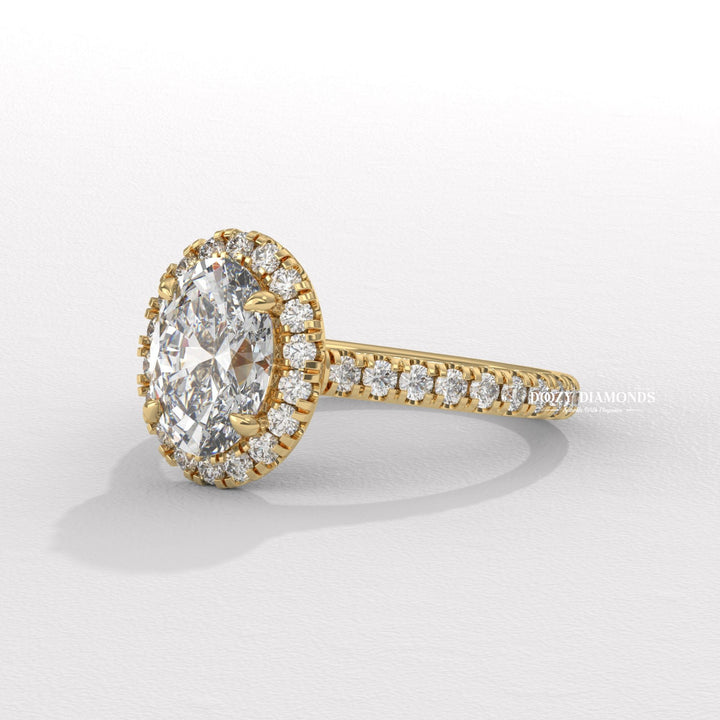 Oval halo engagement ring shown on hand for true-to-life sizing