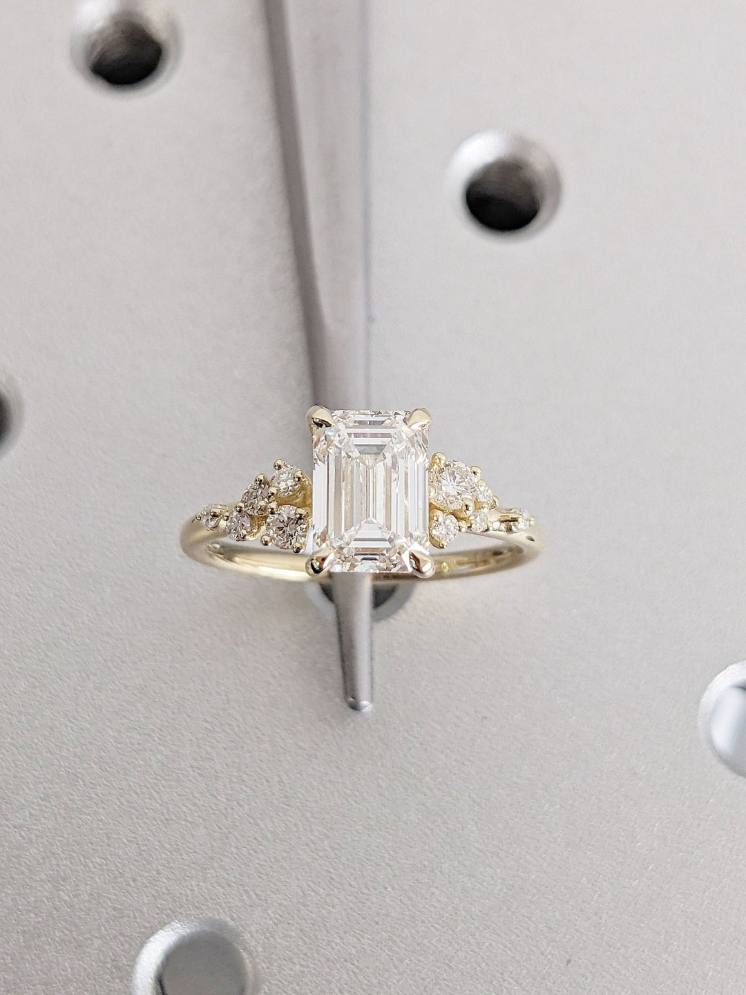 Emerald cluster lab grown diamond ring fitted on finger