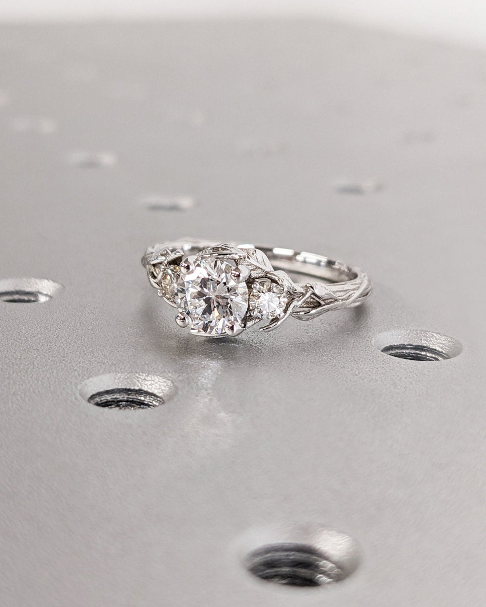 Shop the round cut three stone engagement ring collection online