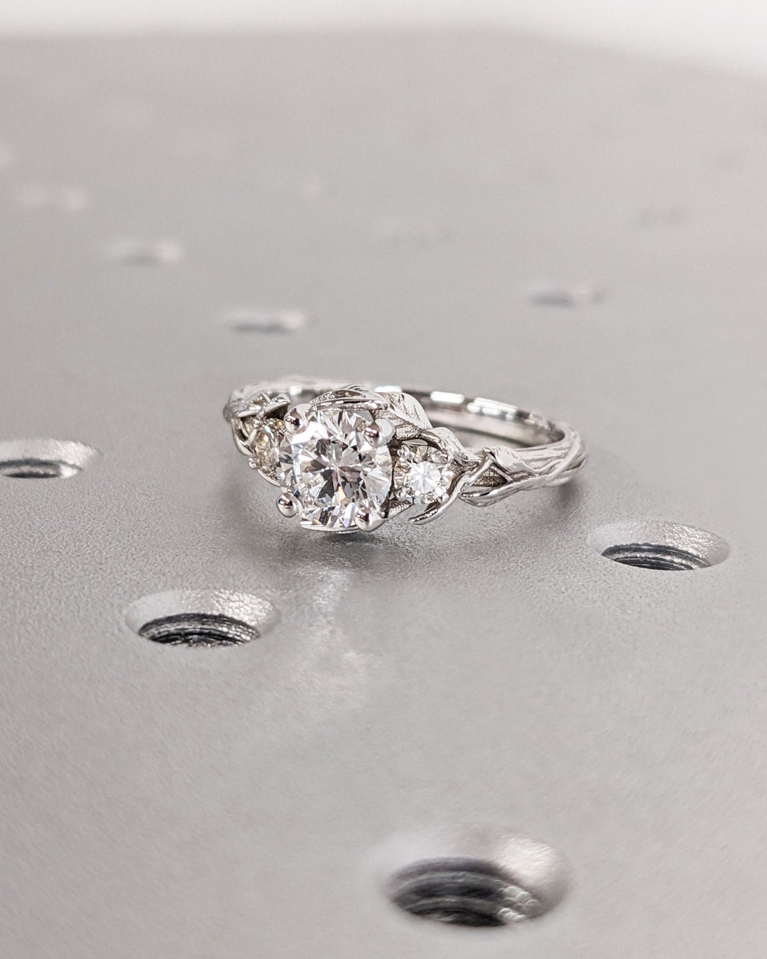 Shop the round cut three stone engagement ring collection online
