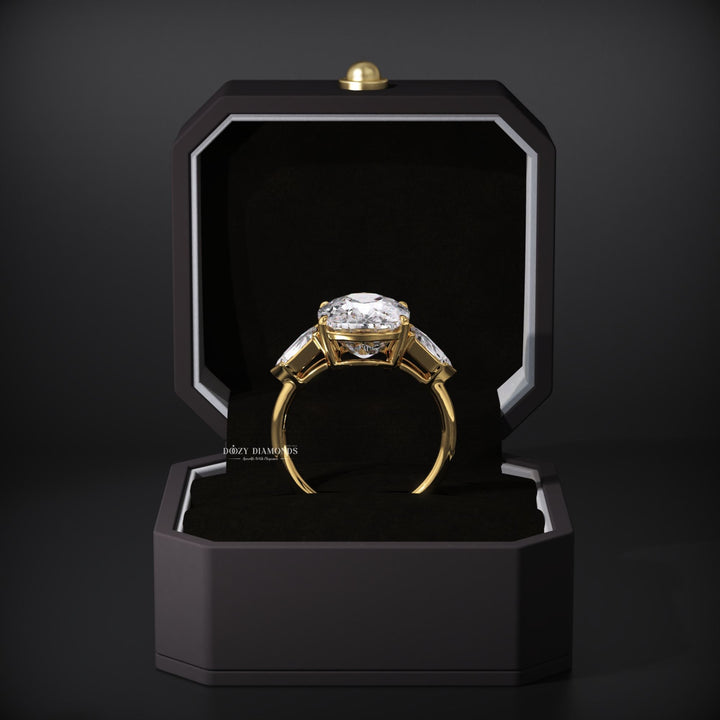 Cushion three stone engagement ring offered in gold and platinum