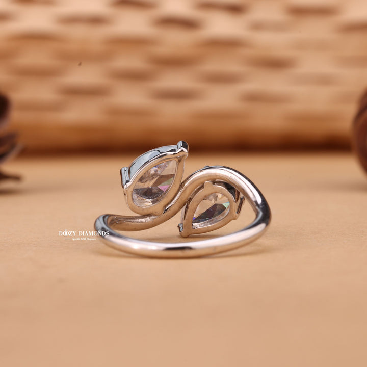 Pear cut engagement ring side view showing band detail