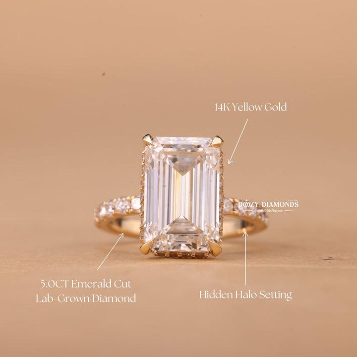 Top-down view of emerald cut hidden halo engagement ring