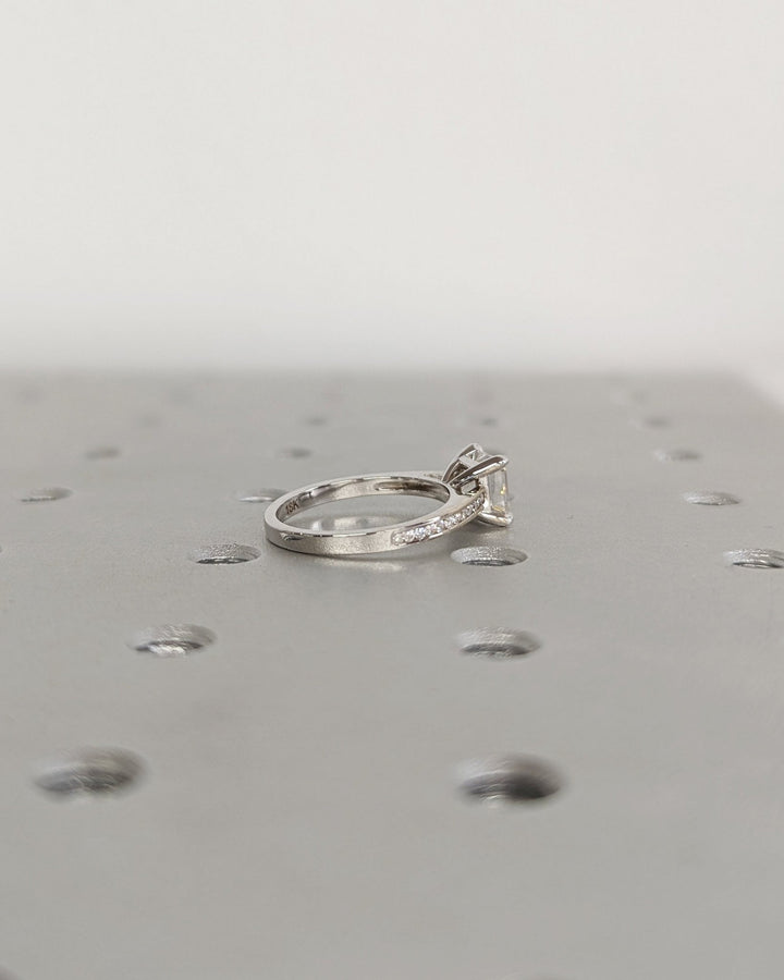 Top-down view of asscher cut solitaire engagement ring