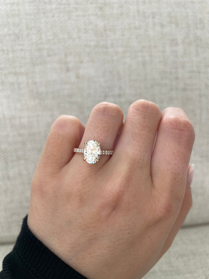 fine diamond craftsmanship, luxury wedding proposal ring, diamond engagement fashion ring, elegant pave ring, oval diamond luxury engagement ring, engagement ring refined design, sparkling pave ring, lab diamond elegance ring, ethical fine jewelry engagement ring, modern bridal luxury ring,