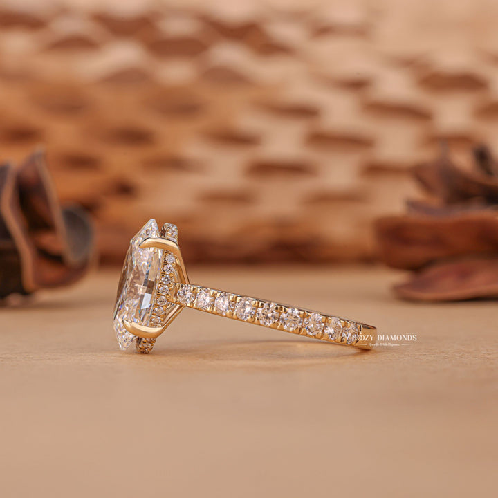 Profile view of oval cut hidden halo engagement ring band