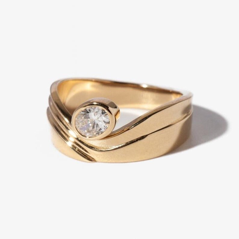 Oval cut engagement ring side view showing band detail