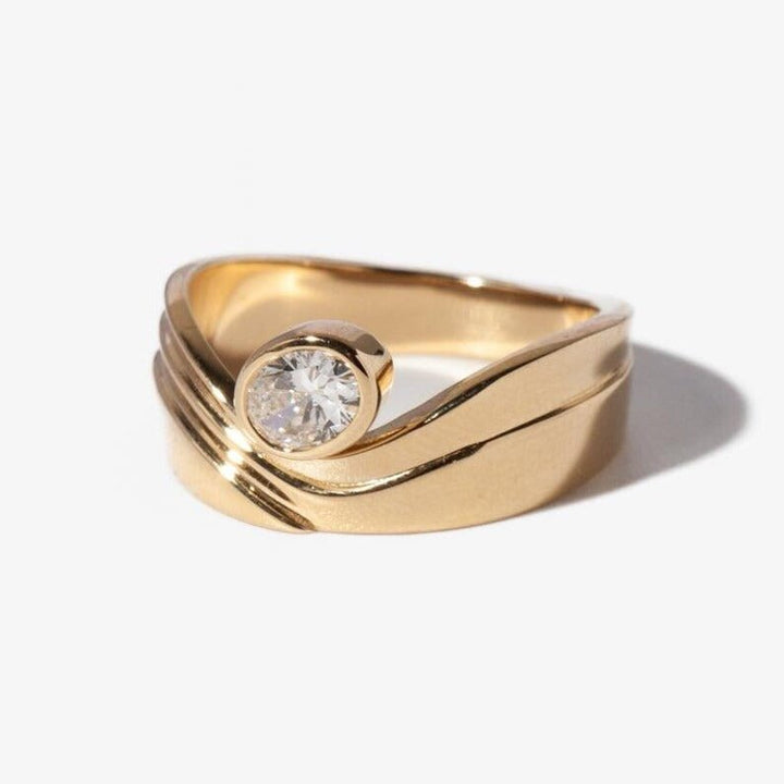 Oval cut engagement ring side view showing band detail