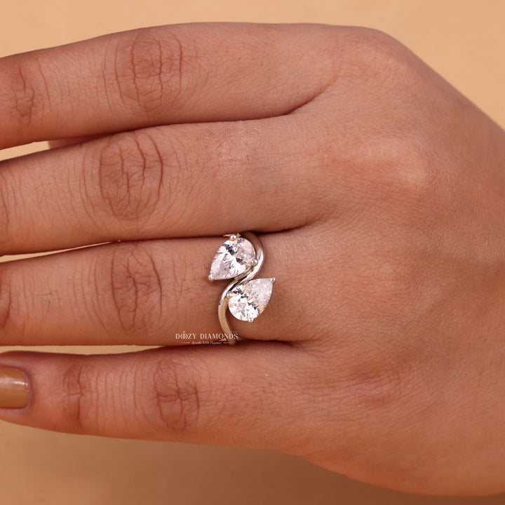 Side angle of pear solitaire diamond engagement ring