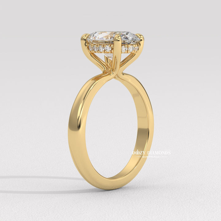 Oval cut engagement ring side view showing band detail
