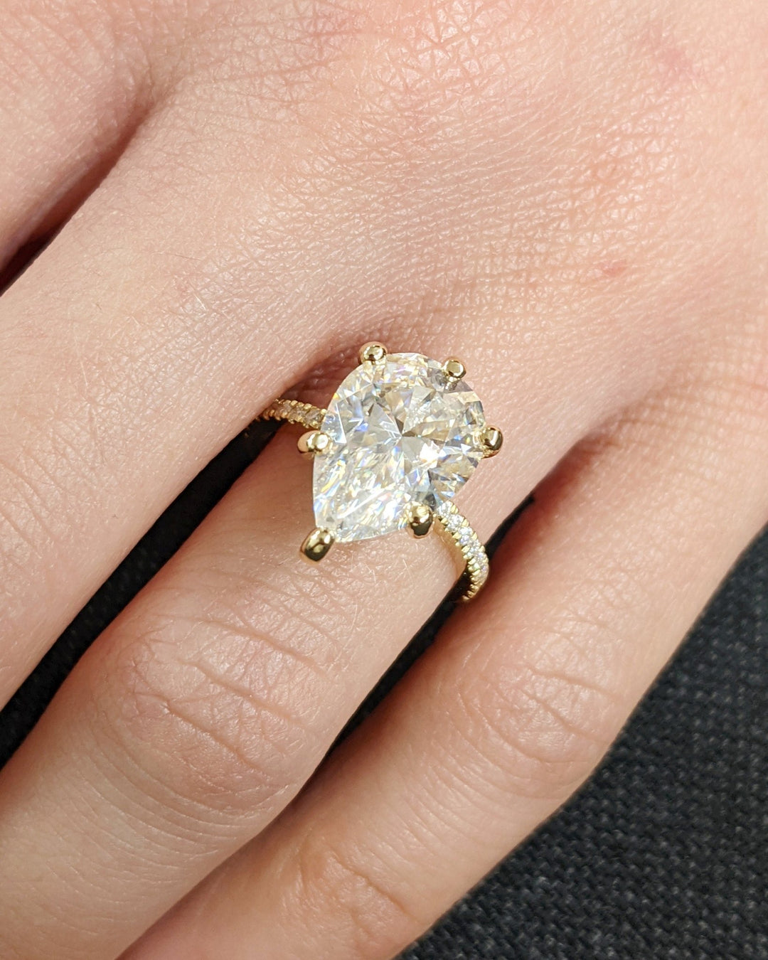 Classic pear hidden halo engagement ring crafted for everyday wear
