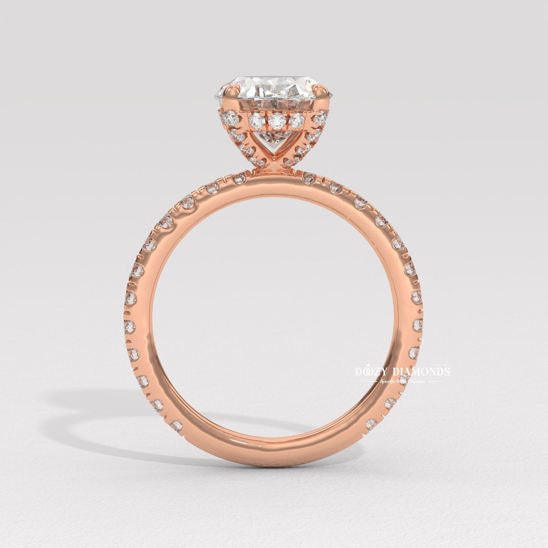 Oval hidden halo lab grown diamond ring fitted on finger