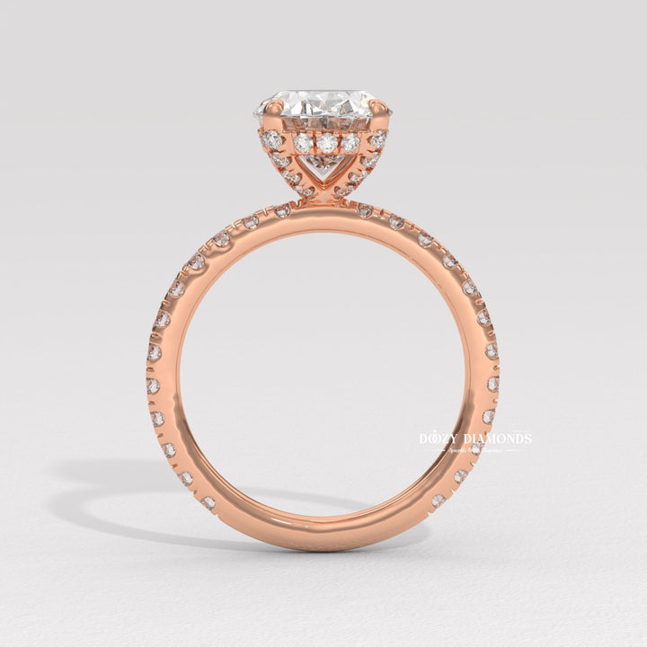 Oval hidden halo lab grown diamond ring fitted on finger
