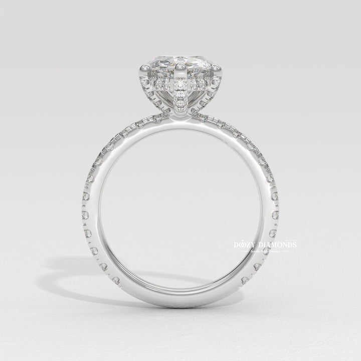 Pear hidden halo engagement ring with brilliant diamond sparkle