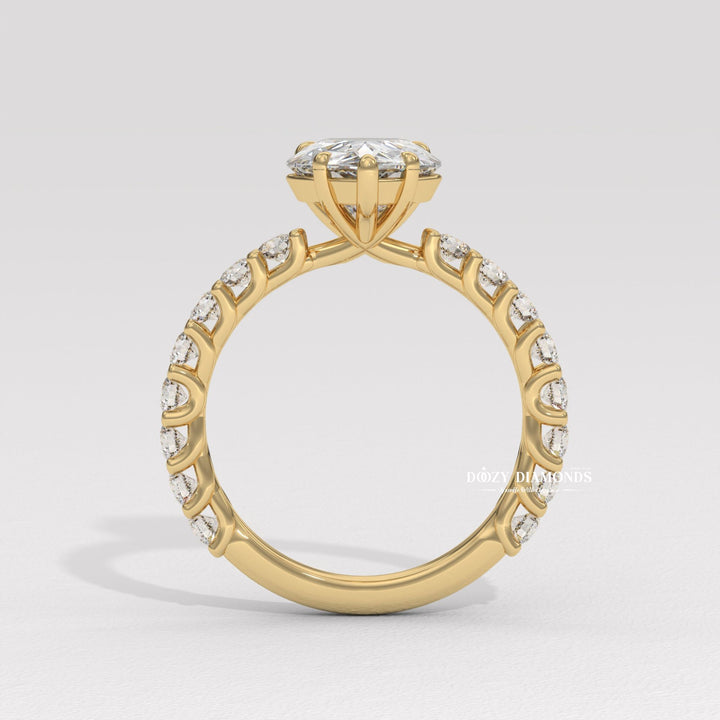 Top-down view of pear cut solitaire engagement ring