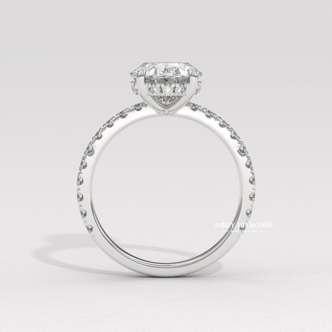 Profile view of oval cut hidden halo engagement ring band