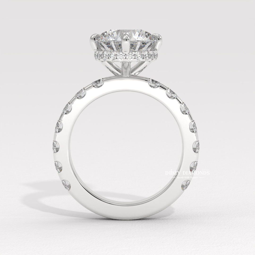 Round hidden halo lab grown diamond ring fitted on finger